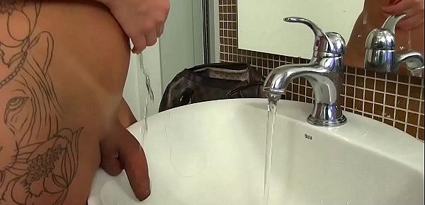  Beautiful Shemale Julia Steinkopf Washes Her Erect Cock at the Sink